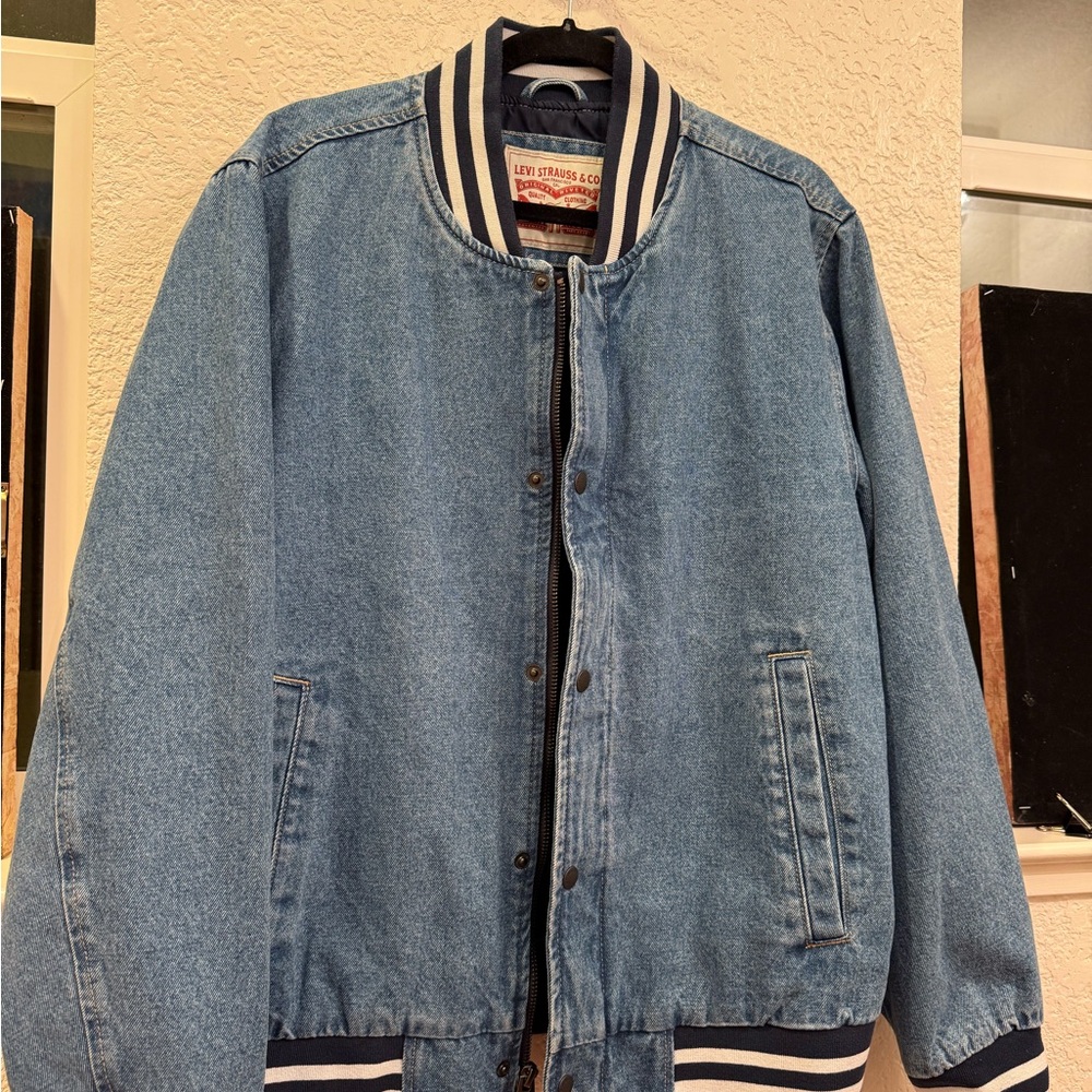 Authentic and Iconic Levi's Men Varsity Bomber Denim Jacket Zip Button Closure.